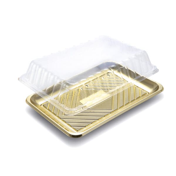 An Alcas Kado gold-colored rectangular plastic tray with a textured pattern is complemented by a partially open transparent High Lid, specifically designed for Kadò trays. Placed on a simple white background, it showcases a sleek, modern aesthetic.