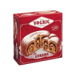 A red box containing Vogríc Gubana Cake from Friuli-Venezia, a spiral-shaped pastry dusted with powdered sugar. The package features images of the delectable cake along with branding elements such as the Vogríc logo and product name, "Vogrig Gubana Cake from Friuli-Venezia (6x850gr case).