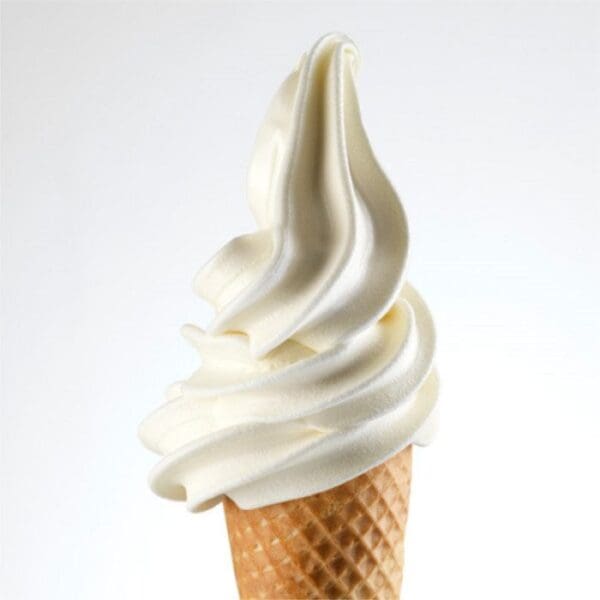 A close-up of a swirled vanilla soft serve ice cream cone with a waffle cone. The ice cream, made irresistibly smooth and creamy with Elenka Yogurt Powder for Gelato, Soft Serve & Slush, is perfectly spiraled, standing out against a plain white background.