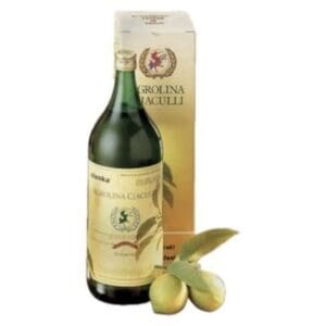 A bottle of Agrolina Ciaouli olive oil stands in front of its box, with two green olives and leaves placed nearby.
