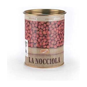 A can labeled “La Nocciola” with an image of many hazelnuts covering the upper part of the label. The lower part has a tan background with the product name in bold black letters.