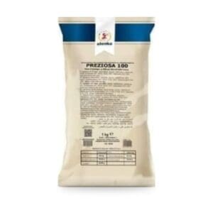A beige and blue 1 kg package labeled “Preziosa 100” by Elenka, featuring product information and a nutrition table on the back.